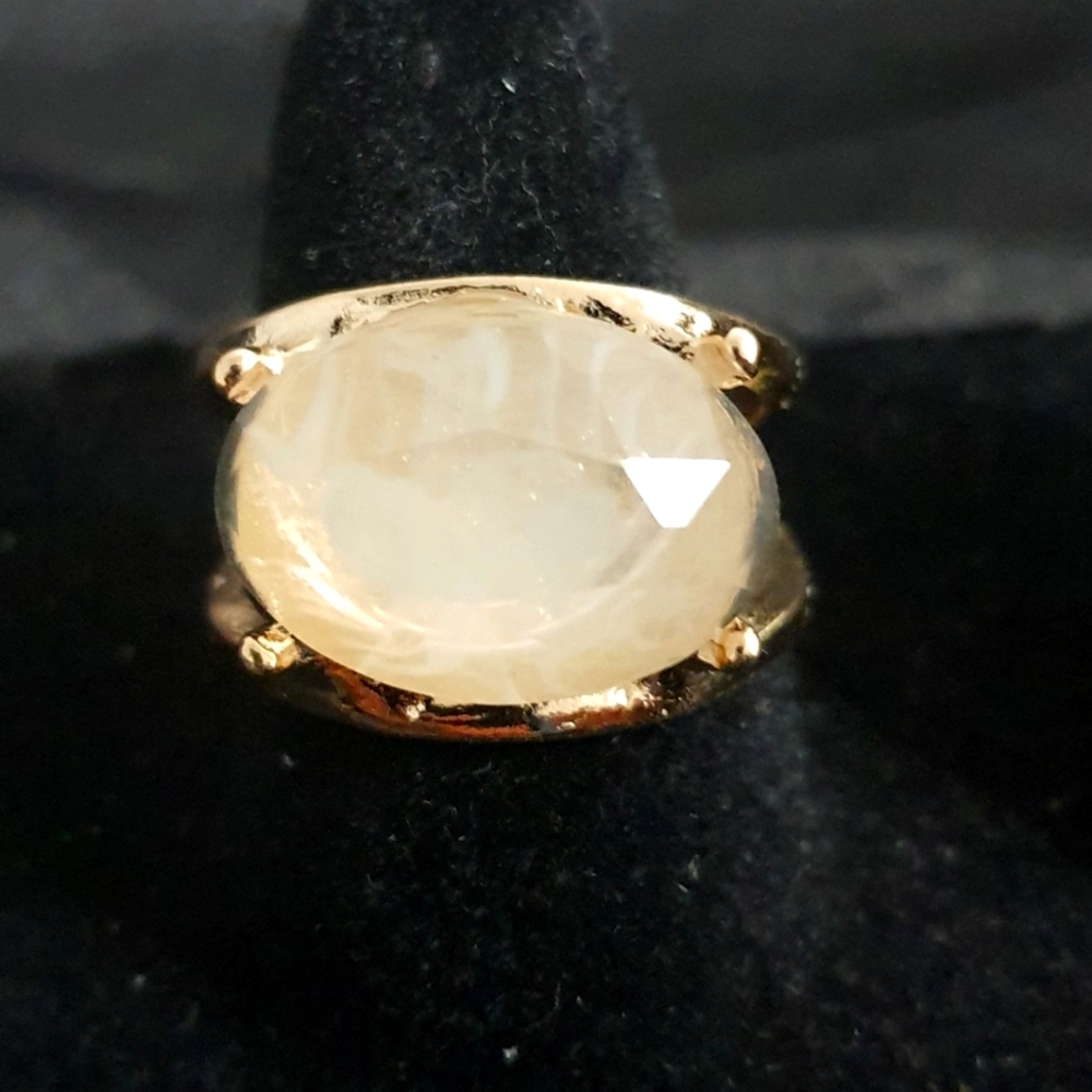 Elegant Gold Ring with Cream Stone